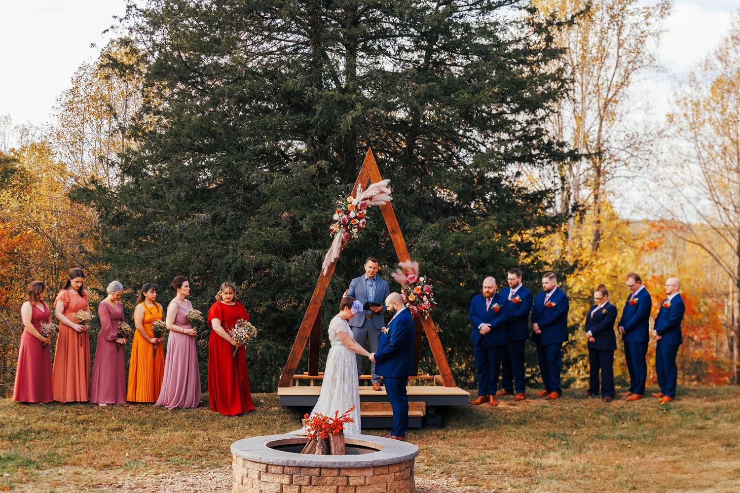Outdoor ceremony surrounded by fall colors