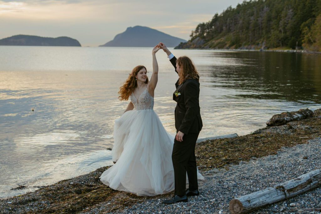 Bride and groom on beach at sunset