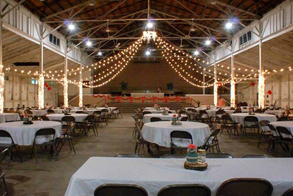 Reception tables inside barn