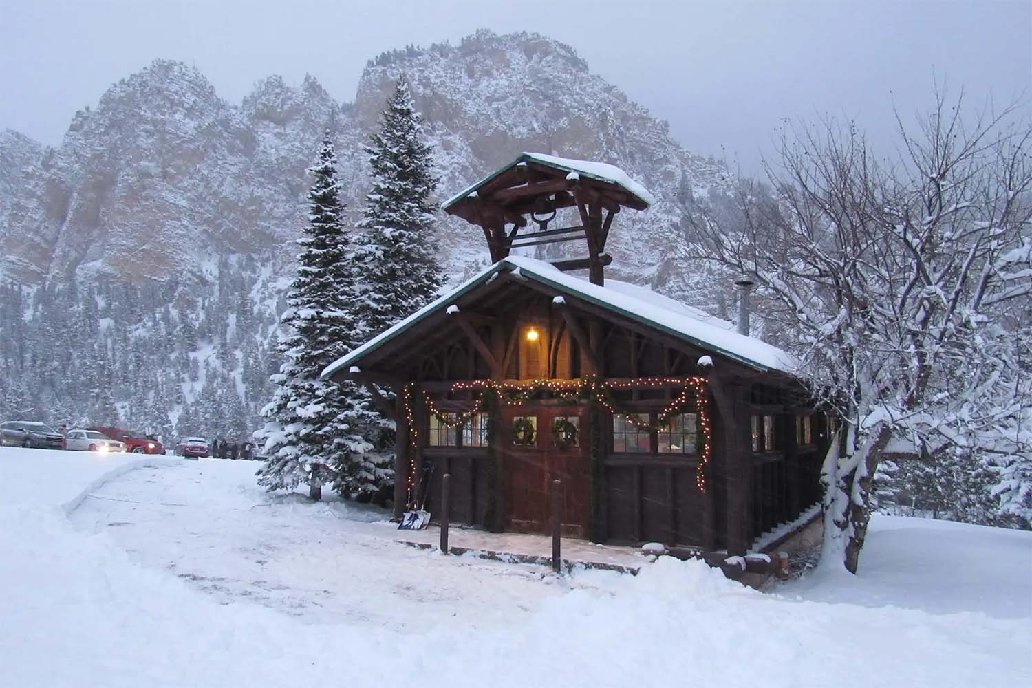 Snow-covered cabin chapel