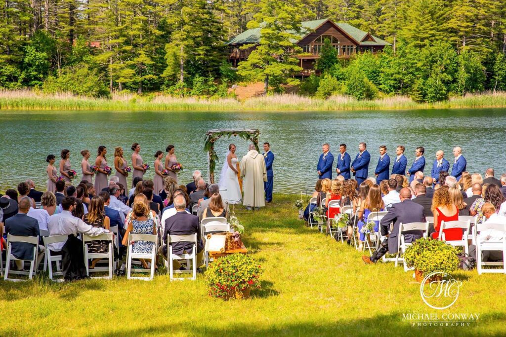 Outdoor lakeside wedding ceremony