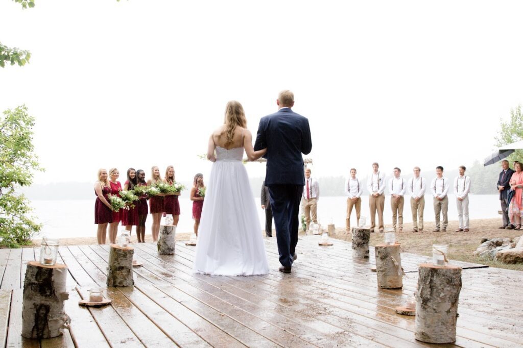 Bride walking down dock